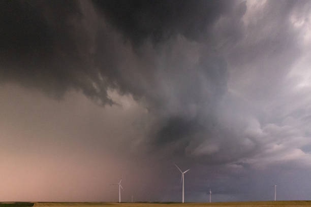 istock Wind farm on agricultural field under the grey overcast sky 1391217884