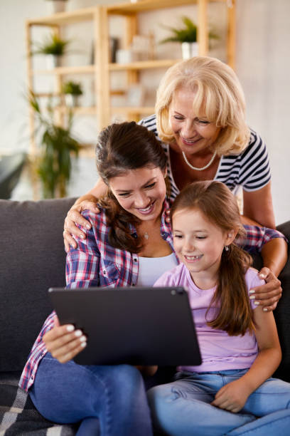 istock Multi-generation family with digital tablet at home 1391218700