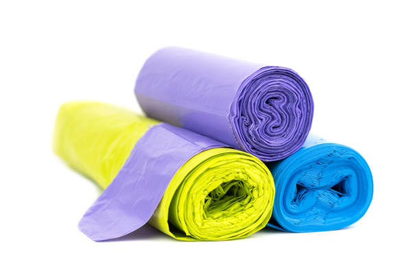 istock Stack of green, blue and purple garbage bags 1391221991