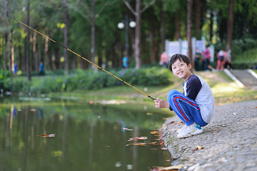 Boy catching fish