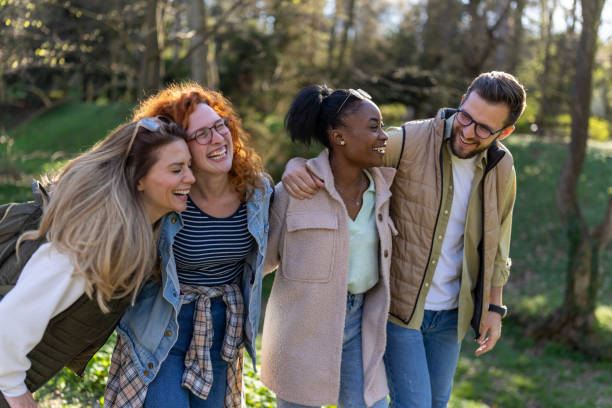 istock Four friends walking in the nature 1391226584