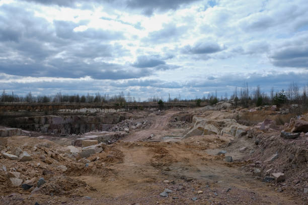 istock Quarry with mining and stone production. 1391227922