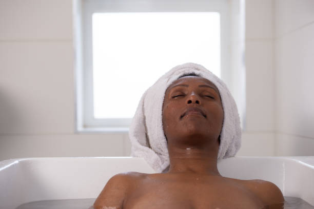 istock Relaxed woman in bathtub. 1391230953