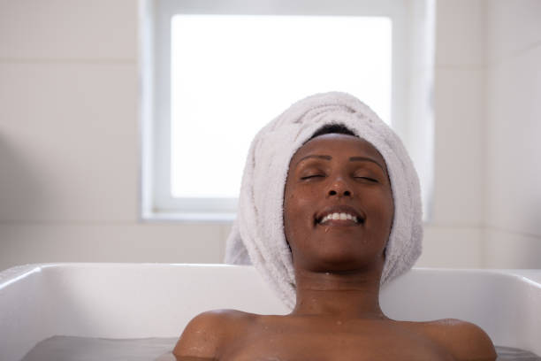 istock Relaxed woman in bathtub. 1391231042