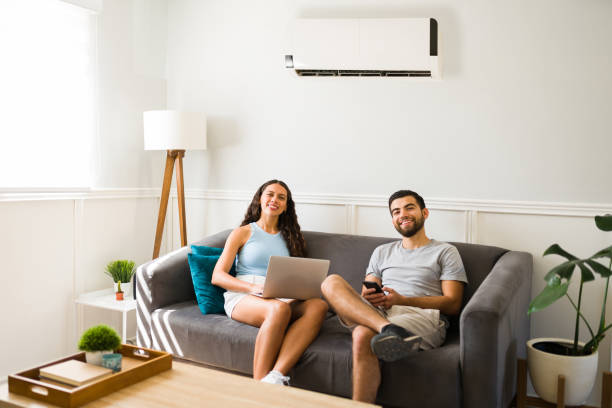 istock Happy couple relaxing with the ac on 1391231164