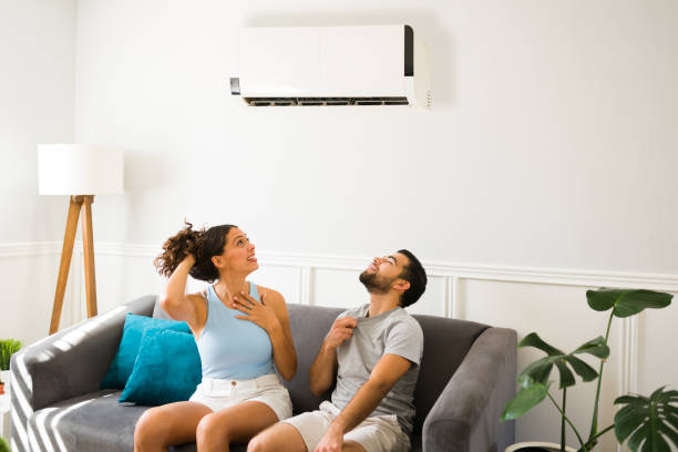 istock Feeling better after turning on the ac 1391232605