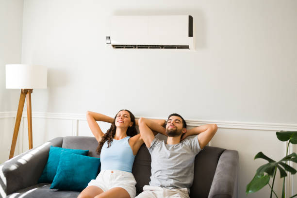istock Relaxed couple feeling cool during a heat wave 1391232686