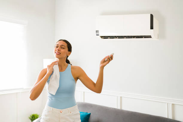 istock Upset woman feeling bad during a heat wave 1391232914