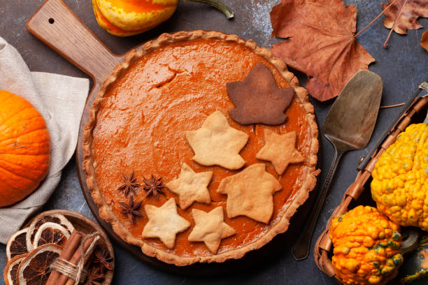 istock Pumpkin pie and various pumpkins 1391233479