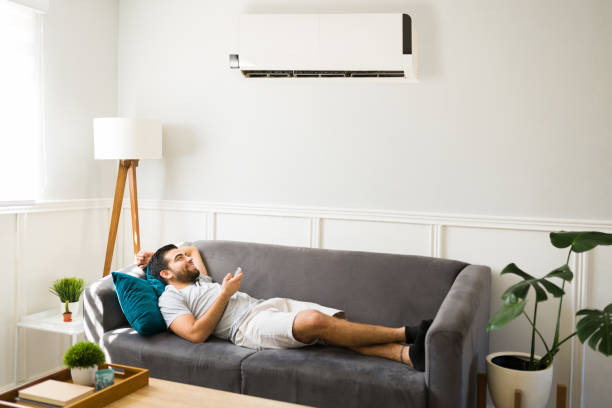 istock Turning on the air conditioning on a hot day 1391233651