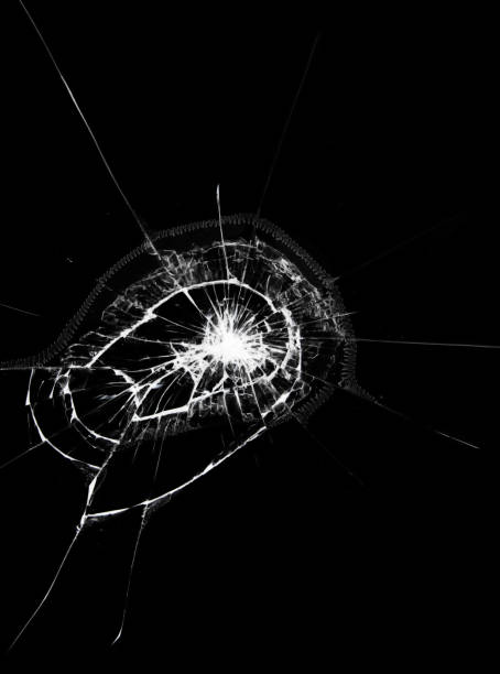 istock Texture of broken smartphone glass. Black background with white cracks on the screen. 1391235234