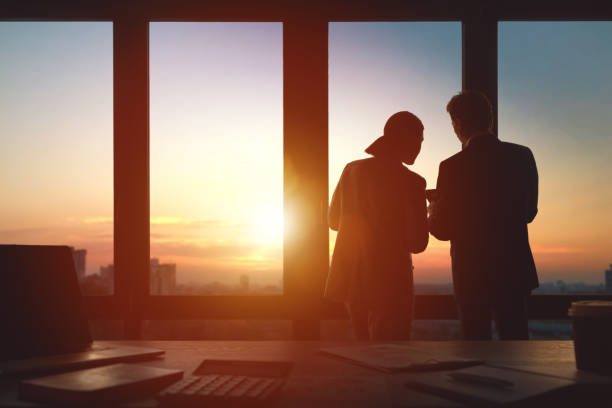 istock Man and woman are working in office 1391239504