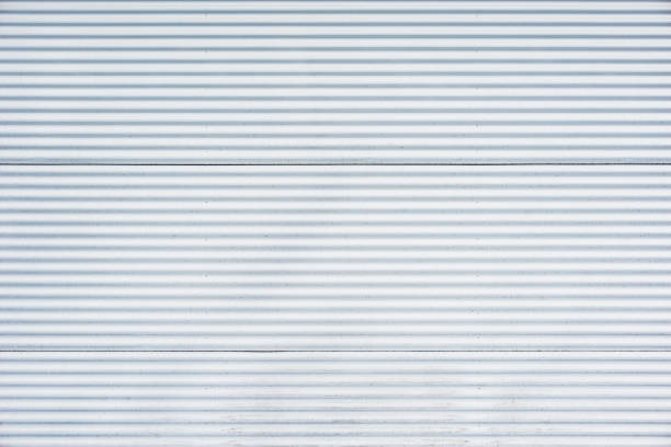 istock White corrugated metal fence. 1391240282