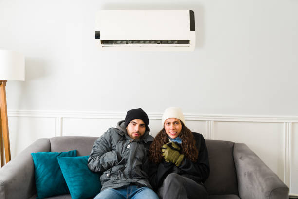 istock Happy couple in warm jackets 1391242582