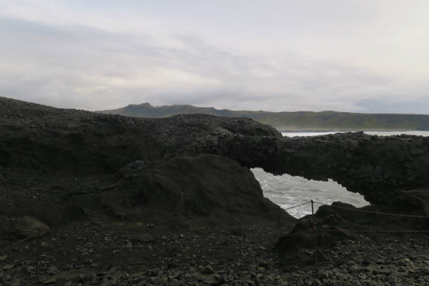 istock Black beach and the tide in Iceland 1391243919