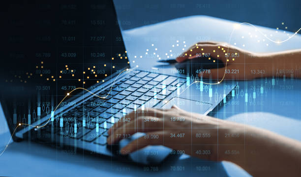 istock Trader analyzing data on virtual screen. Price graph and indicator.Stock market invest and crypto currency. Stock market and business investment. 1391244110