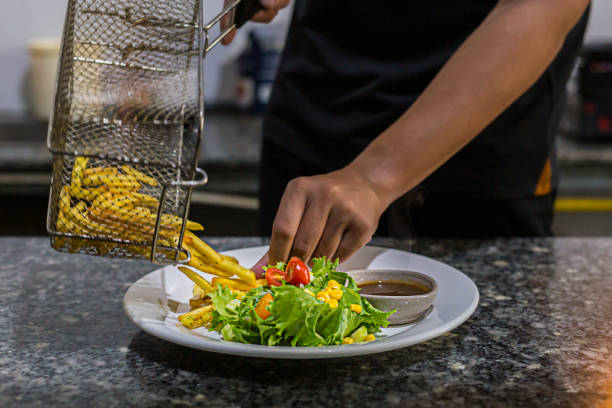istock Chef prepering beef steak dish before serving to customer restaurant kitchen 1391252278