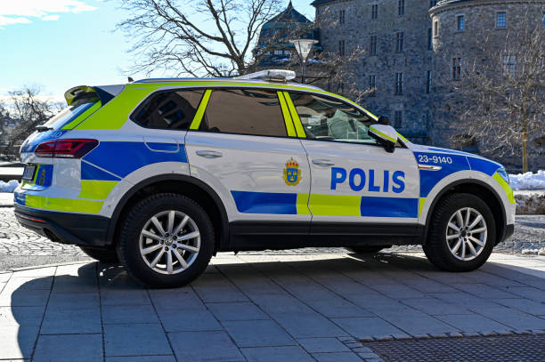 patrol car parked infront of orebro castle - örebro slott bildbanksfoton och bilder