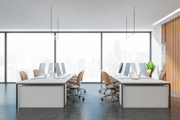 istock Top view of light office interior with chairs and table, decoration and window 1391256031