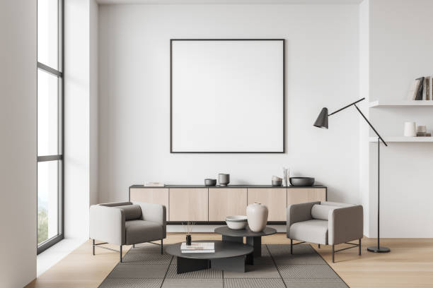 istock Corner view on bright living room interior with empty poster 1391256681