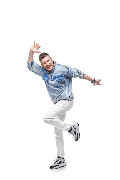 istock handsome young man in denim jacket with fist up 1391258052
