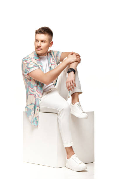 istock handsome young man in shirt looking away 1391258211