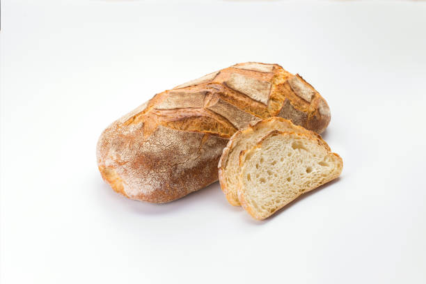 istock White craft wheat bread with slices 1391259419