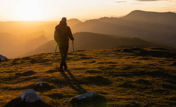 istock Silhouette Of A Rock Climber On The Peak 1391261816