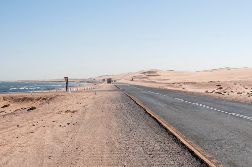 Sandstorm on the Trans-Kalahari Highway between Walvis Bay and Swakopmund, Namibia, Africa.