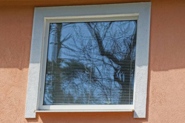 istock one white square large window on the brown concrete wall 1391263802