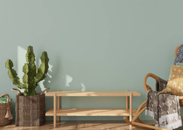 istock Empty light green wall in modern living room. Mock up interior in scandinavian, boho style. Free, copy space for your picture, text, or another design. Rattan armchair, cactus. 3D rendering. 1391264584