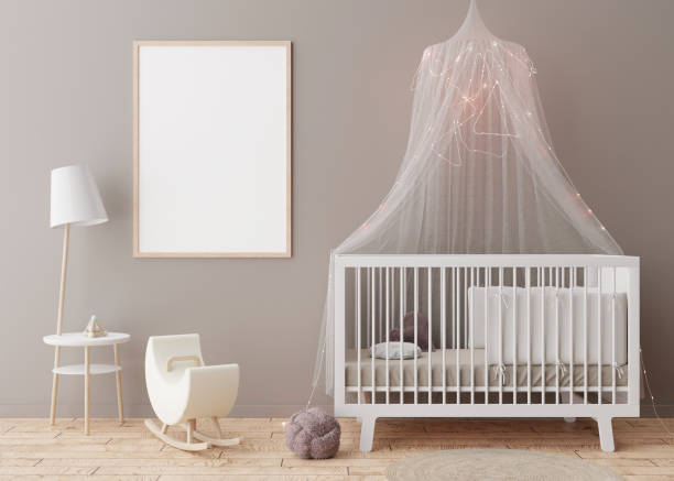 istock Empty vertical picture frame on grey wall in modern child room. Mock up interior in scandinavian style. Free, copy space for your picture. Baby bed, table. Cozy room for kids. 3D rendering. 1391264596