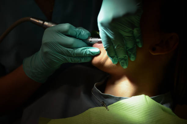 Closeup photo with dentist examining a patient