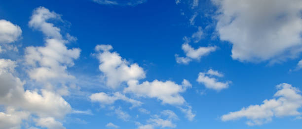 istock Blue sky with beautiful white clouds. Wide photo. 1391273366