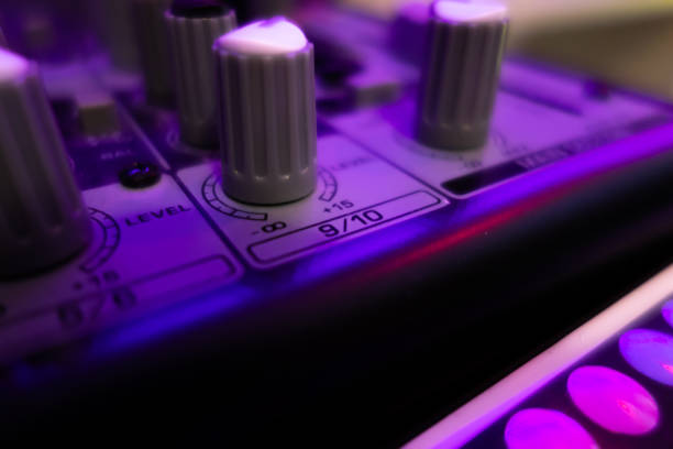 A close up view of sound mixer on the table in studio