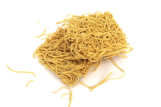 istock Two dry noodle briquettes on a white plate 1391278583