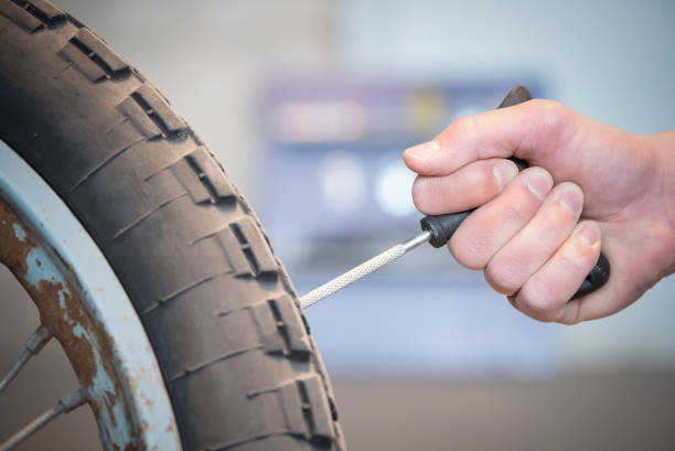 istock Motorcycle wheel repair. 1391280887