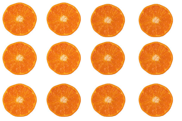 Tangerine wheels stacked on a white background.