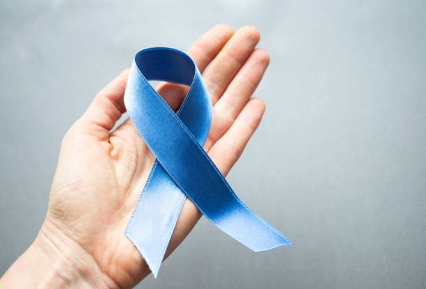 istock blue ribbon in hand prostate cancer awareness 1391292057