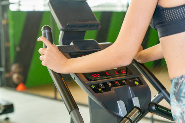 istock woman running on treadmill 1391293258