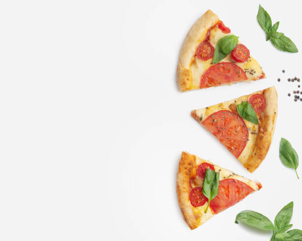 istock margarita pizza slices on white plate with basil 1391293792
