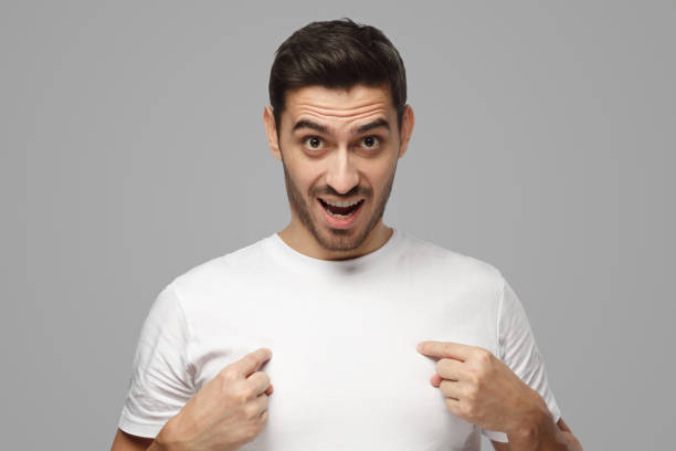 istock Young man pointing to himself with question if he did something wrong 1391298404