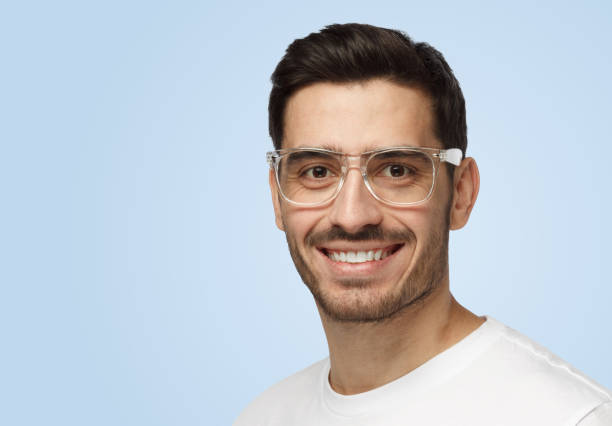 istock Young casual attractive European man smiles friendly while looking at camera 1391298434