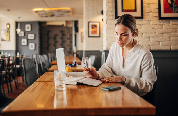 istock Businesswoman in cafe 1391307057
