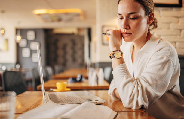 istock Businesswoman in cafe 1391307066