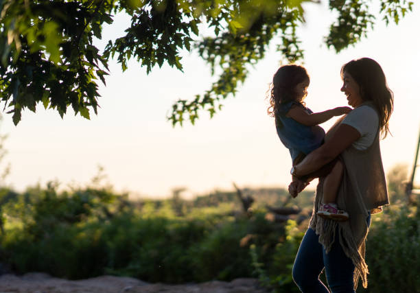 istock Mother and Daughter Outside 1391309640