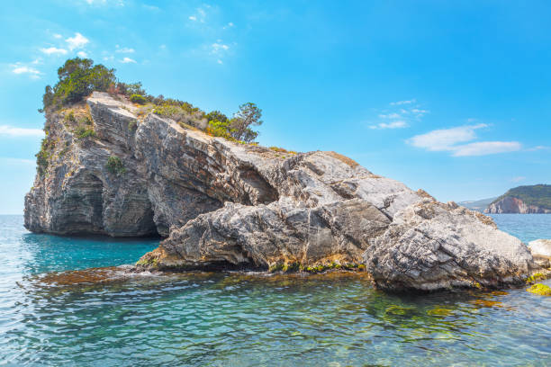 istock Rocky Islet in the sea water 1391310819