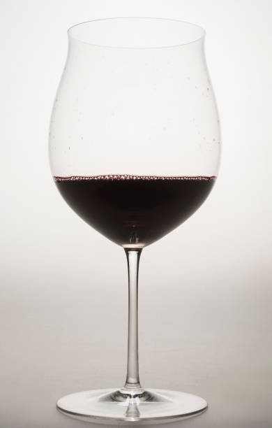 istock red wine in a special glass on a light background in a studio without people close-up 1391310925
