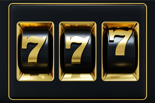 Slot machine, bingo 777. Gold black winning slot machine, macro image.