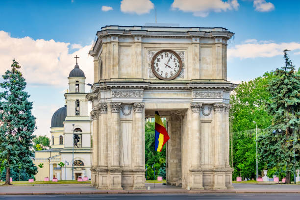 Triumphal Arch Downtown Chisinau Moldova Triumphal Arch and Nativity Cathedral in Downtown Chisinau Moldova chisinau photos stock pictures, royalty-free photos & images